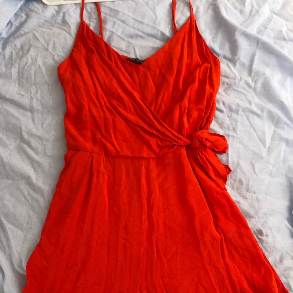 Red/orange romper. **DONATING 9/17**